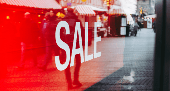 Photo of sale sign in front of a store.